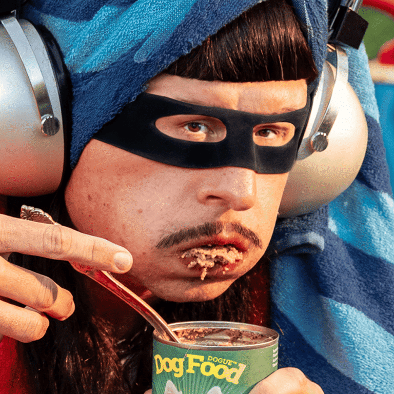 Oliver Tree gives a taste of his upcoming album and eats a lot of gross things in latest music video for “Superhero”